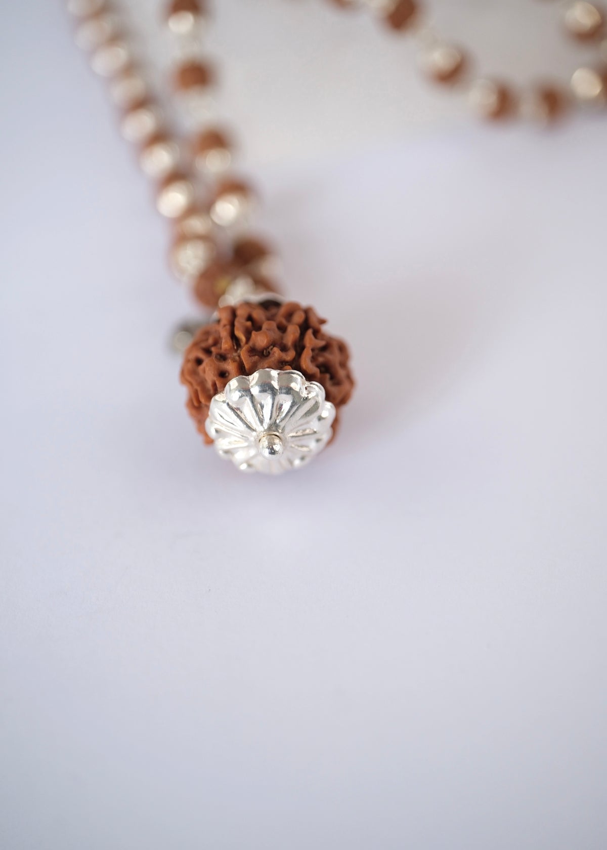 Sterling silver capped seven mukhi rudraksha