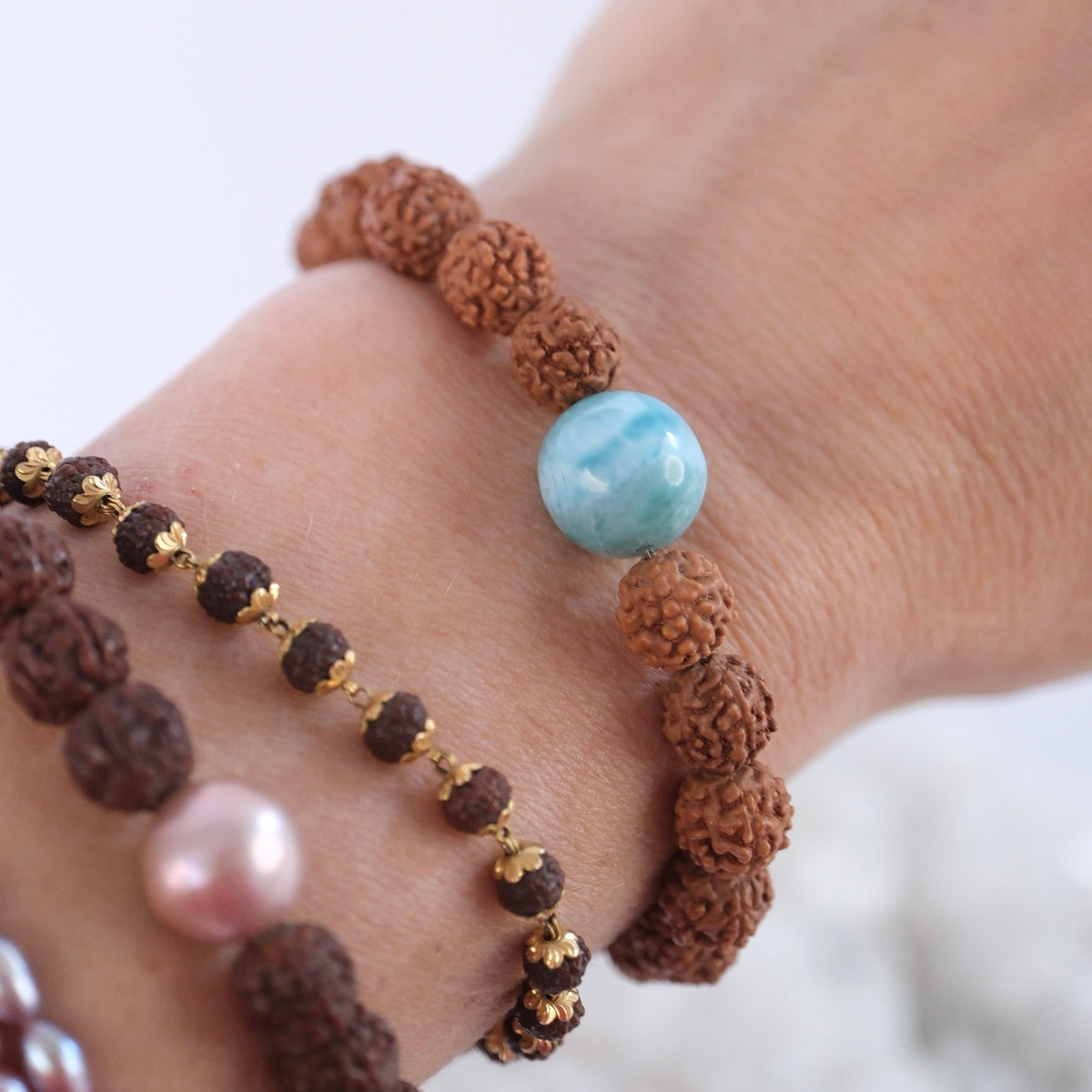 Larimar crystal bracelet for the throat chakra, calm, and speaking your truth, worn at the wrist.