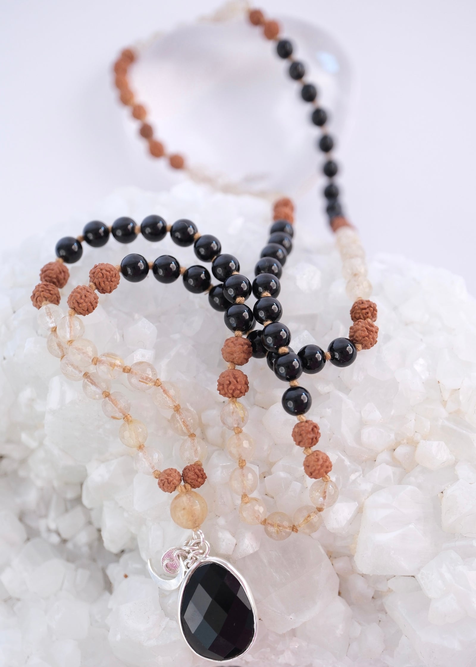 Tantrika mala with faceted black tourmaline pendant and golden rutilated quartz beads
