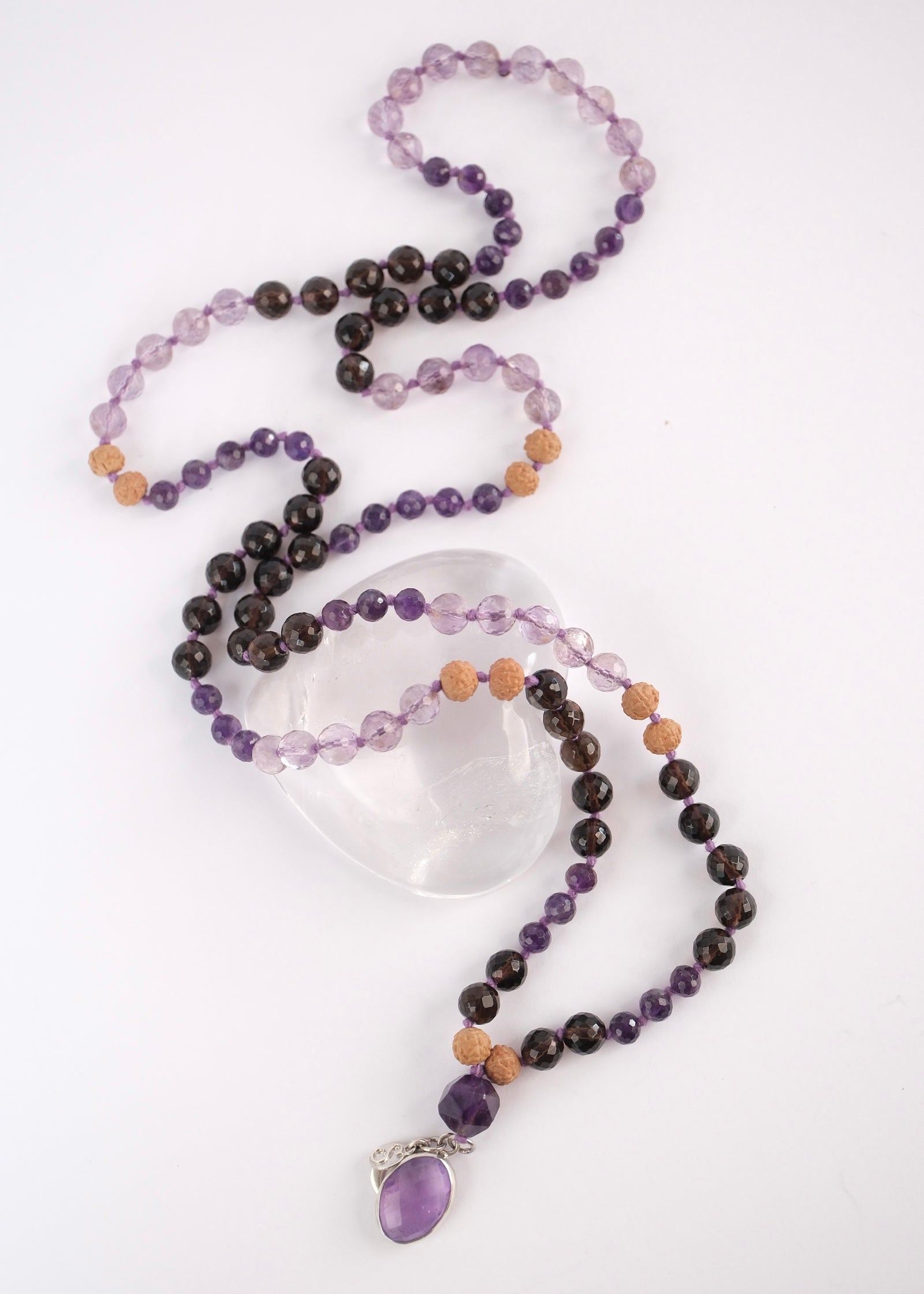 Tejasvi spiritual warrior mala with faceted smoky quartz, amethyst, lavender quartz and amethyst pendant