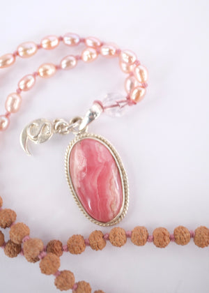 Madhurya mala with deep pink rhodochrosite pendant, small Rudraksha and pink Akoya pearls