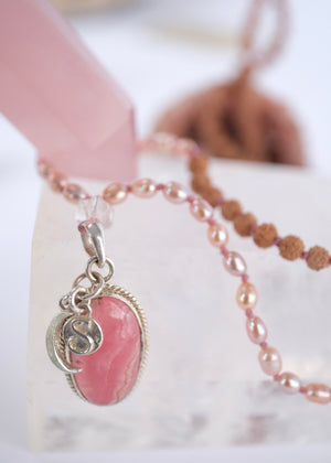Madhurya mala with deep pink rhodochrosite pendant, small Rudraksha and pink Akoya pearls