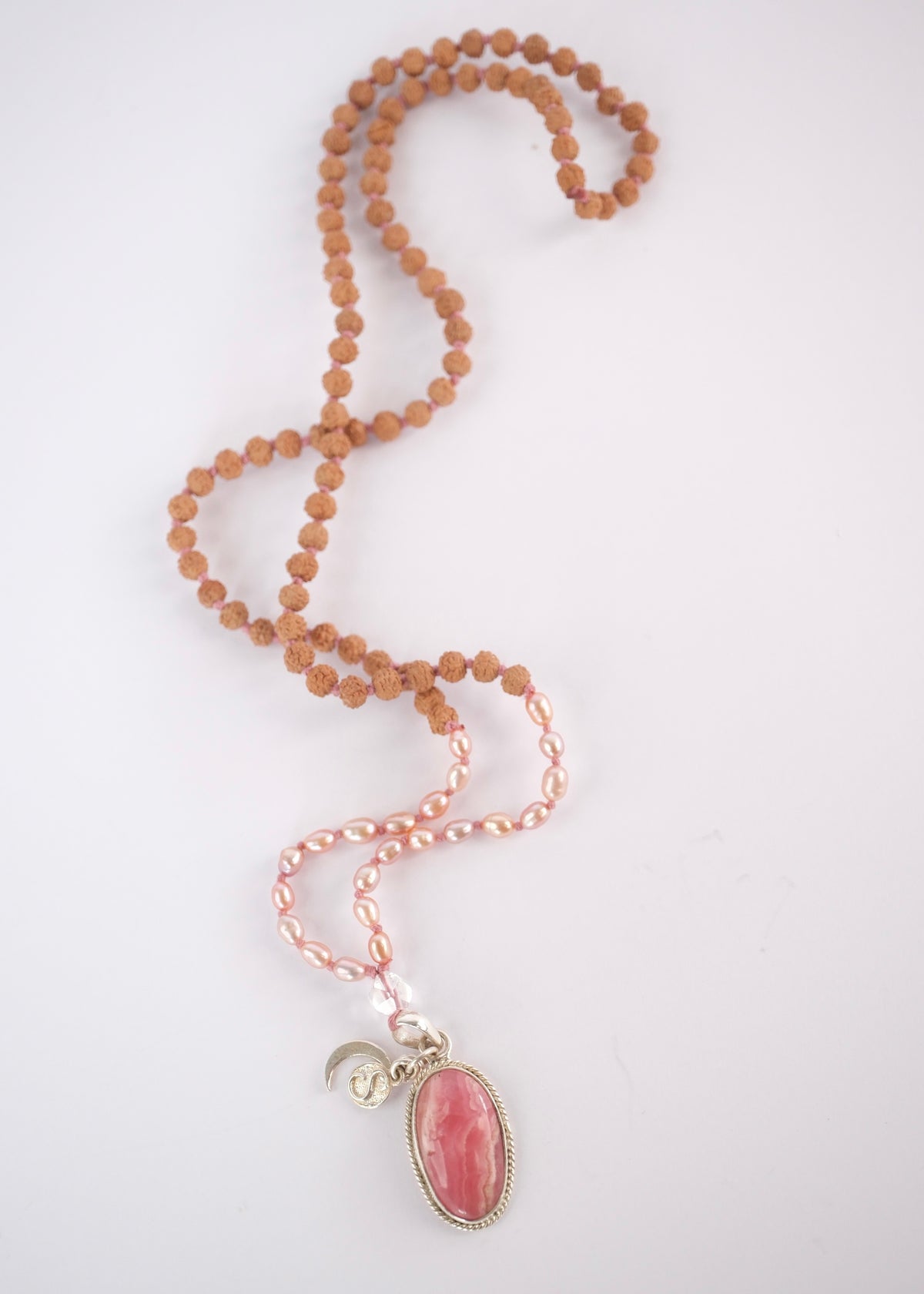Madhurya mala with deep pink rhodochrosite pendant, small Rudraksha and pink Akoya pearls