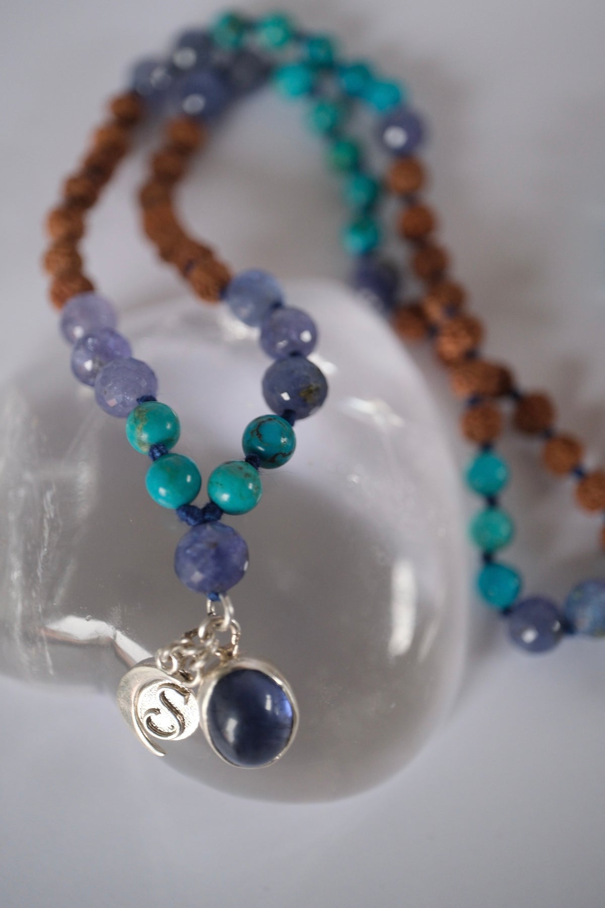 Violet blue tanzanite and iolite prayer mala for third eye awakening, intuition, and inner vision.