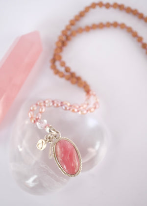 Madhurya mala with deep pink rhodochrosite pendant, small Rudraksha and pink Akoya pearls