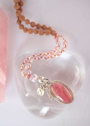 Madhurya mala with deep pink rhodochrosite pendant, small Rudraksha and pink Akoya pearls
