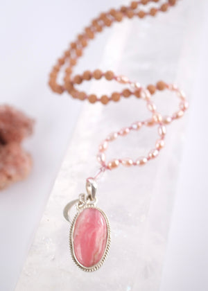 Madhurya mala with deep pink rhodochrosite pendant, small Rudraksha and pink Akoya pearls
