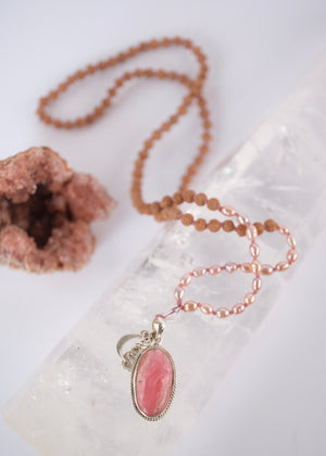 Madhurya mala with deep pink rhodochrosite pendant, small Rudraksha and pink Akoya pearls