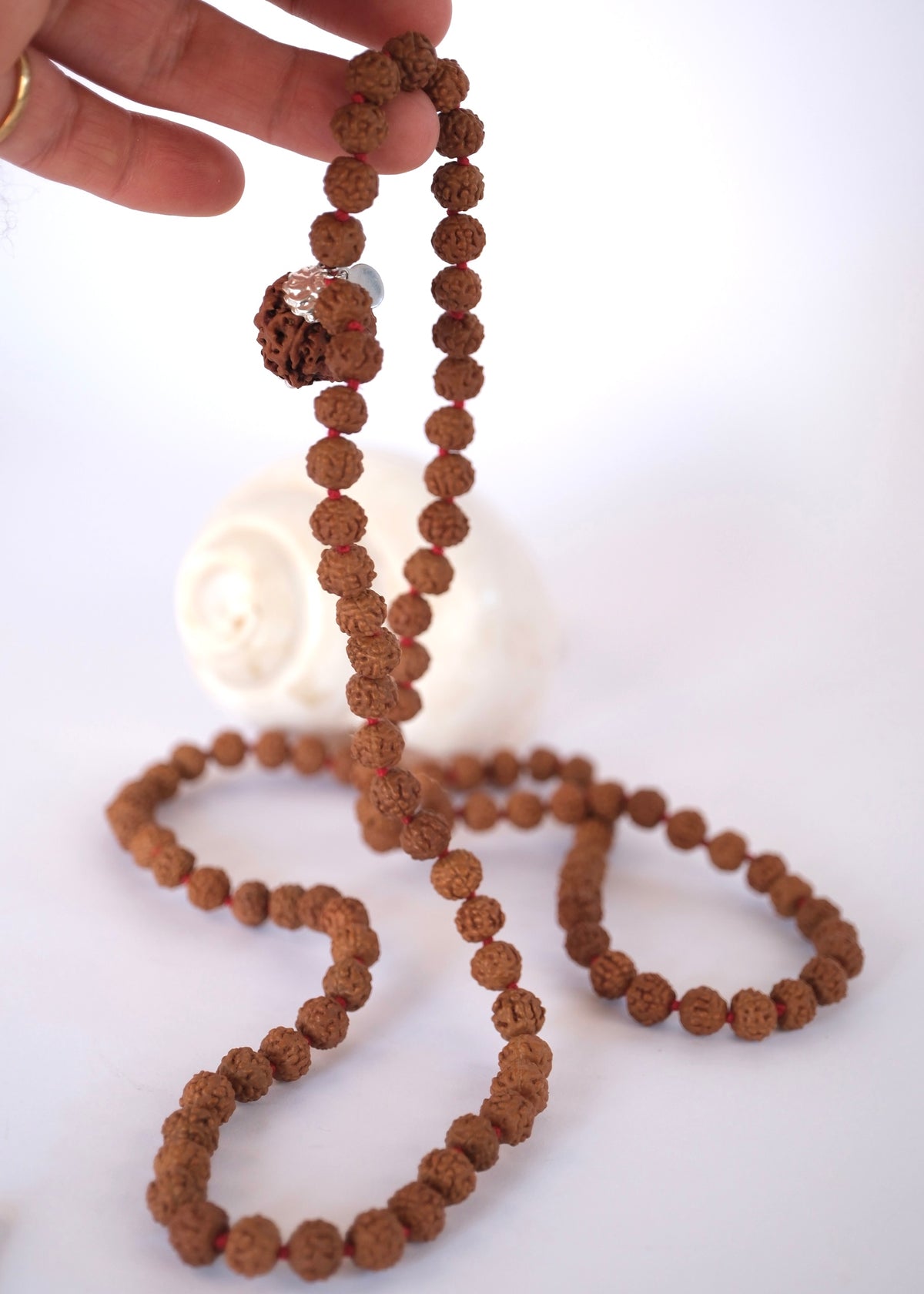 SHIVOHAM Universal Connection Japa Mala featuring authentic Nepal 5 Mukhi Rudraksha and sterling silver accents.