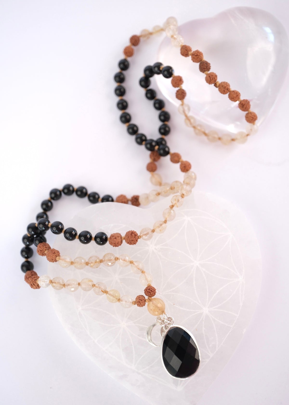 e beads with Rudraksha on the energy worker’s mala