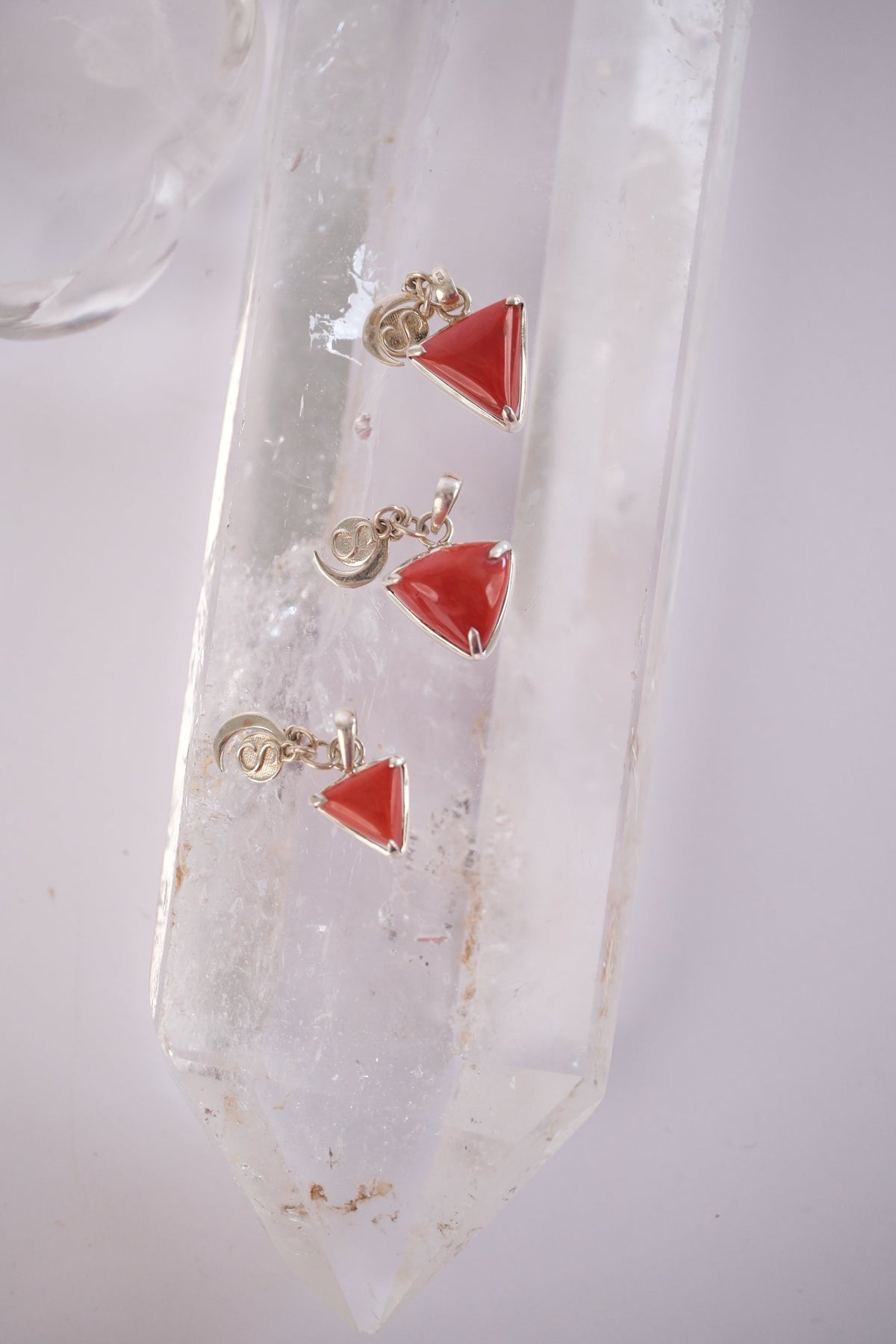 There coral pendants in Two sizes of Italian red coral Mars yantra pendants in sterling silver, Sacred Moonga red coral pendant for those prescribed coral in Vedic astrology