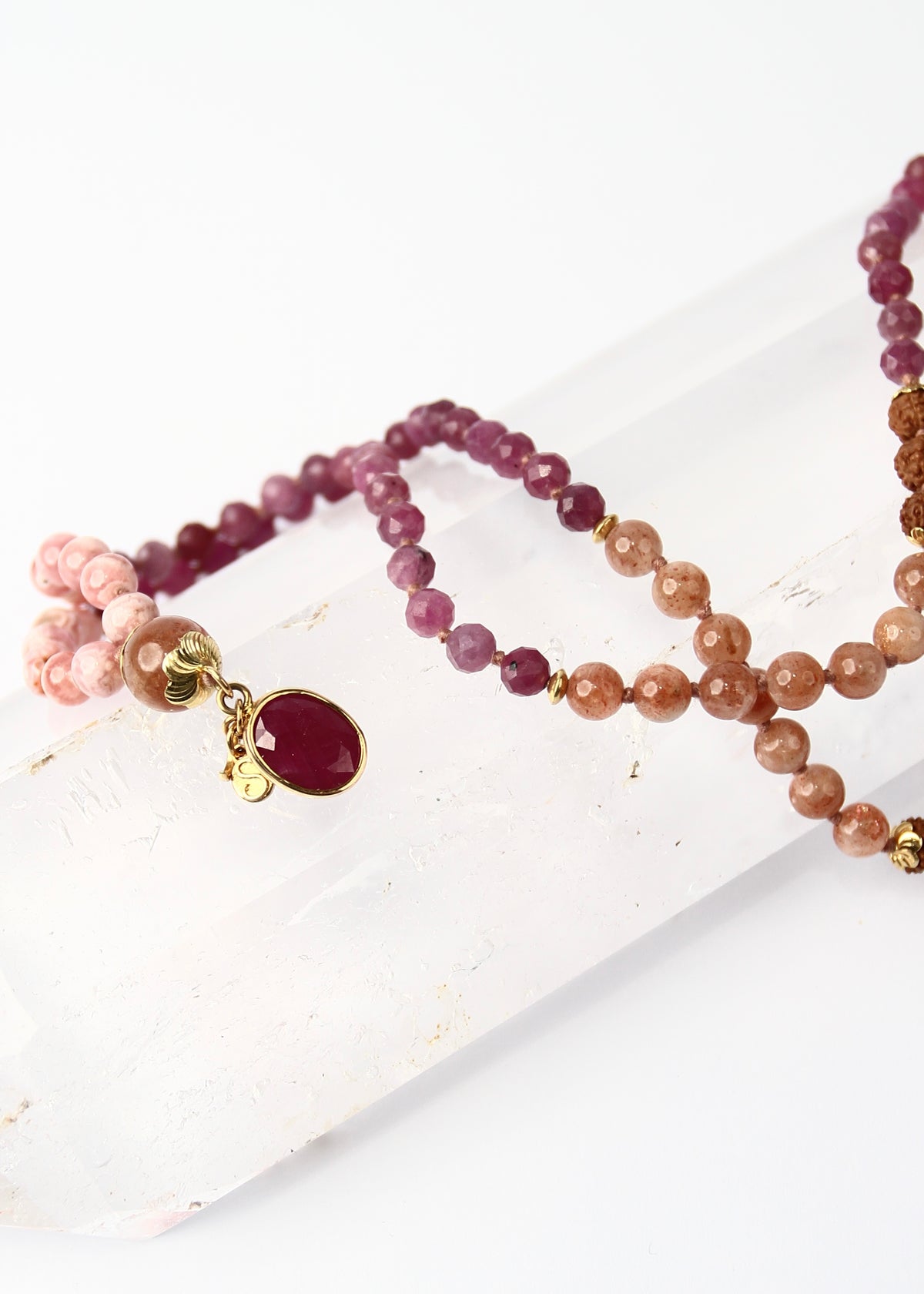 AMMA Woman of Light Ruby Mala with Rose Gold, Sunstone and Rhodochrosite.