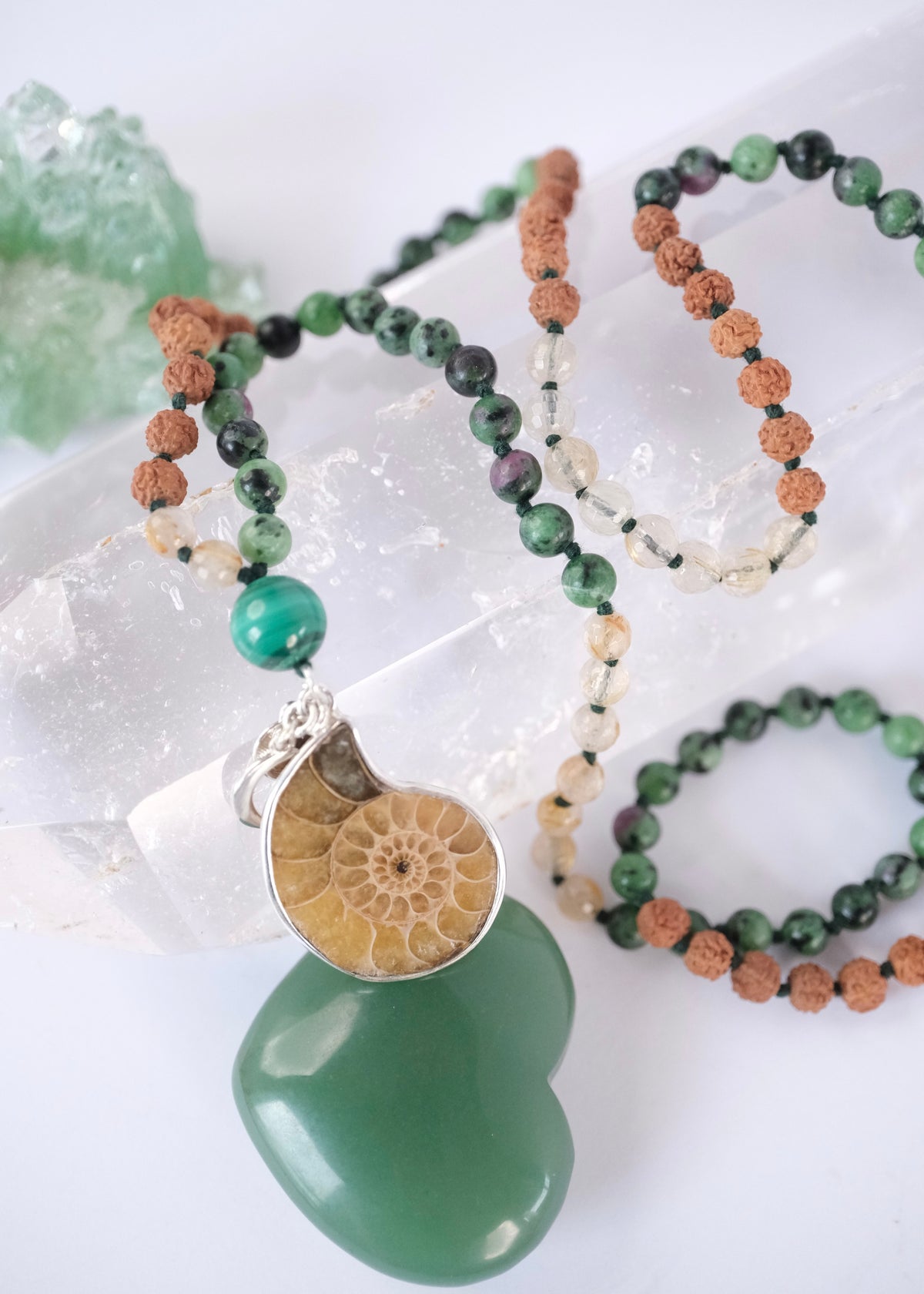 Divine Mala of green and gold with fossil