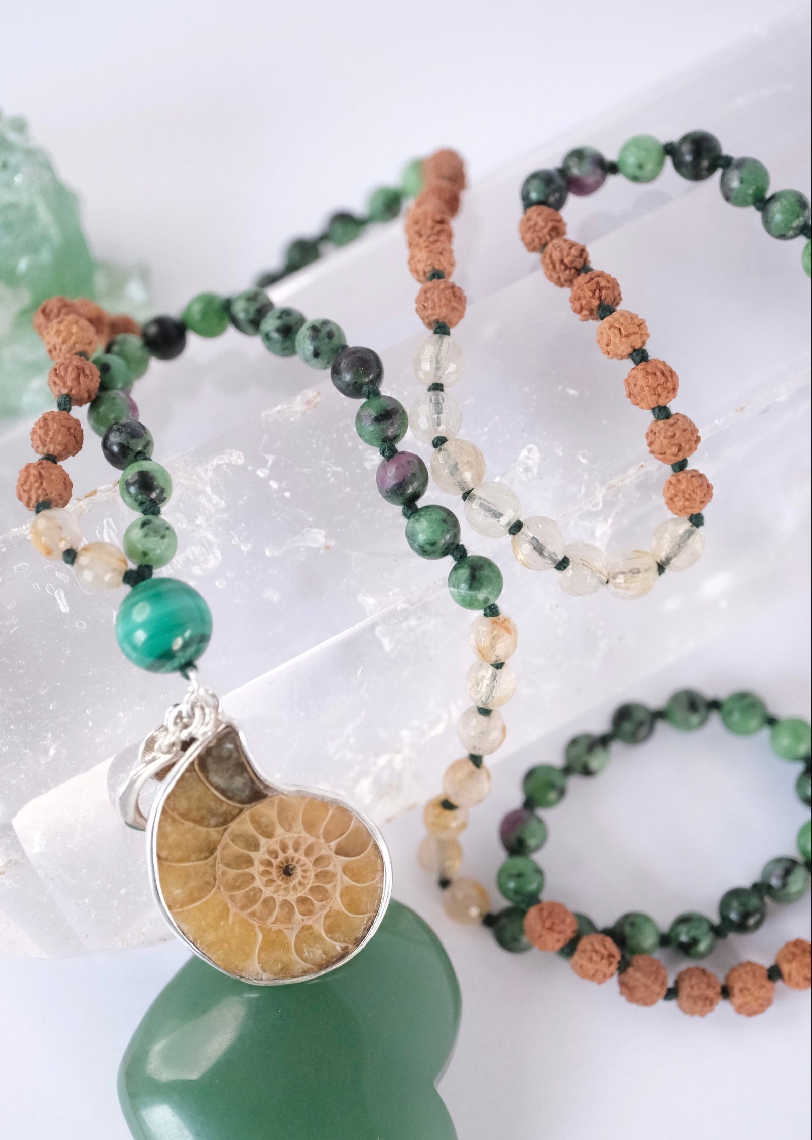 Divine Mala of green and gold with fossil
