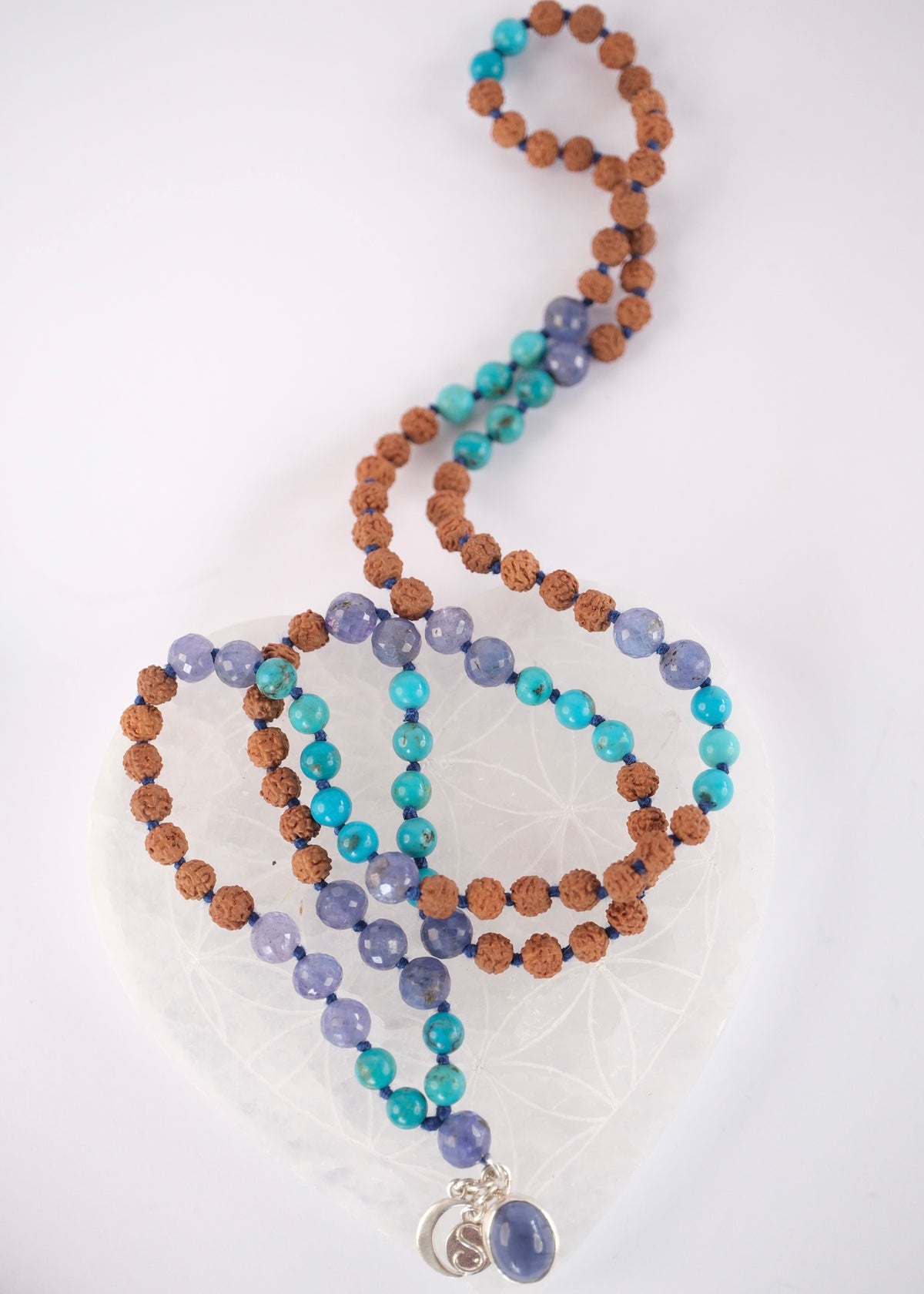 Divya Chakshu mala of the awakened seer with faceted tanzanite, old Persian turquoise, Rudraksha, and a premium iolite pendant in sterling silver.