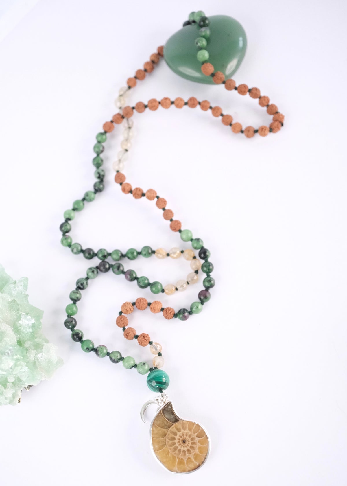 Siddha Maya seer’s mala with ammonite spiral pendant, ruby zoisite, rutilated quartz and malachite, handcrafted manifestation mala