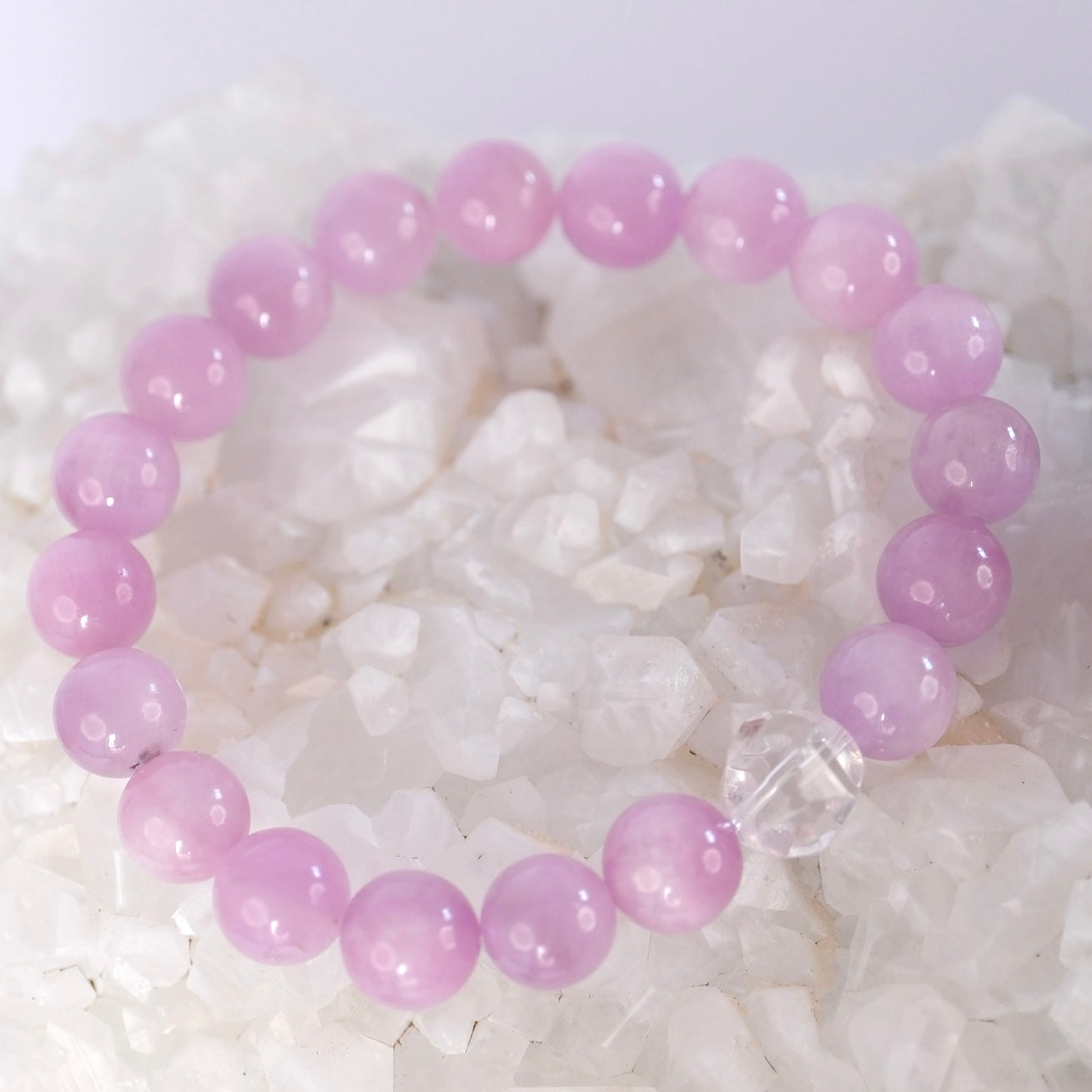 Kunzite heart healing bracelet with a Herkimer diamond amplifier, for unconditional love, peace, and purification.