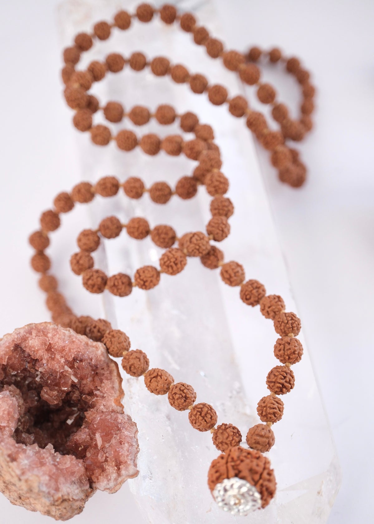 Hand strung Nepal Rudraksha mala with crescent moon and S Shivoham charms, courage joined to wisdom.