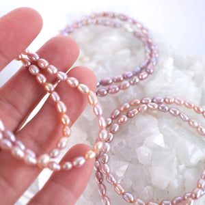 . Grace of the Moon bracelet of lustrous Akoya pearls in soft pink, lilac, and apricot hues