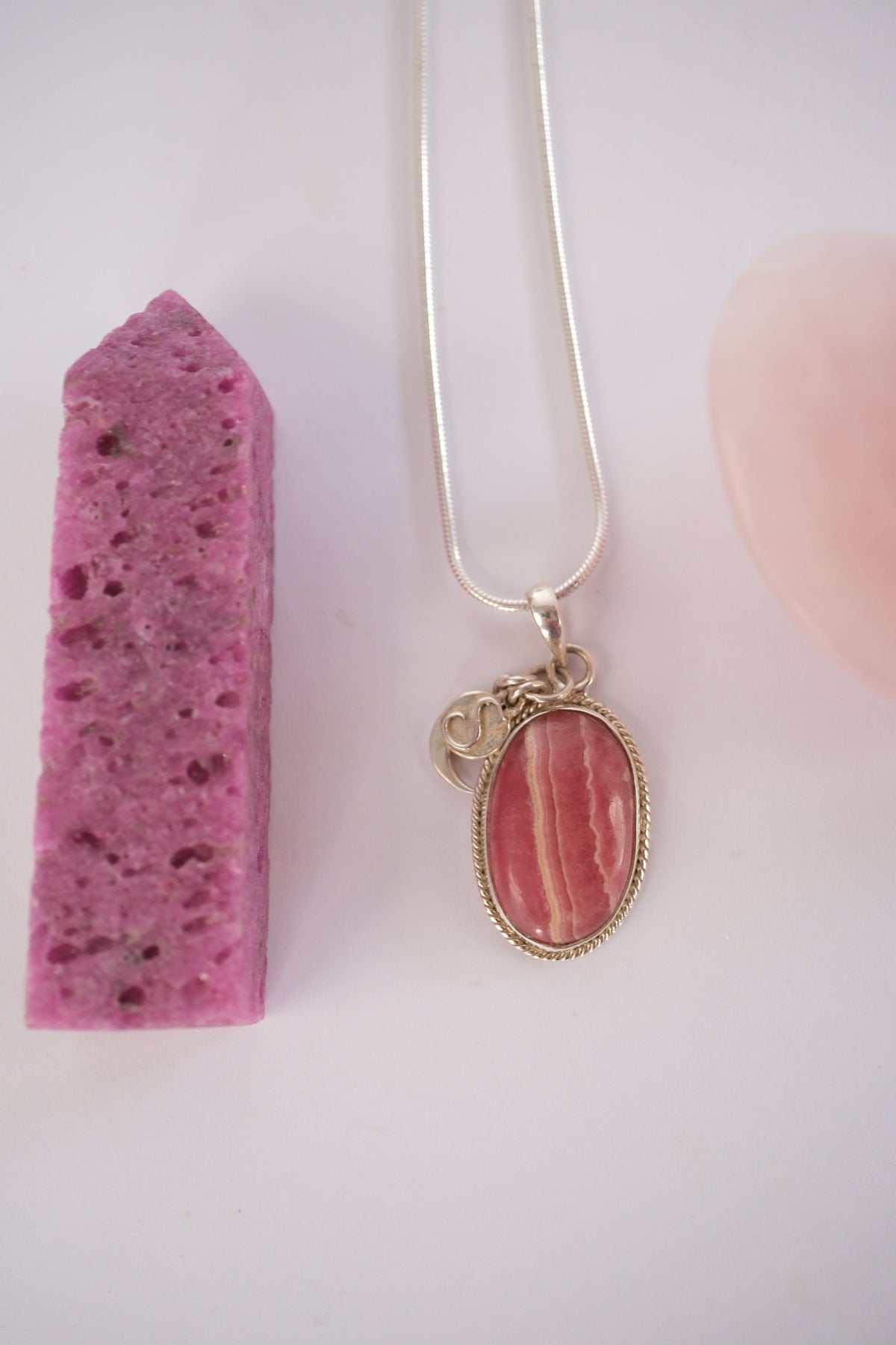 Rhodochrosite heart stone pendant on a sterling silver chain, for heart healing and self love.