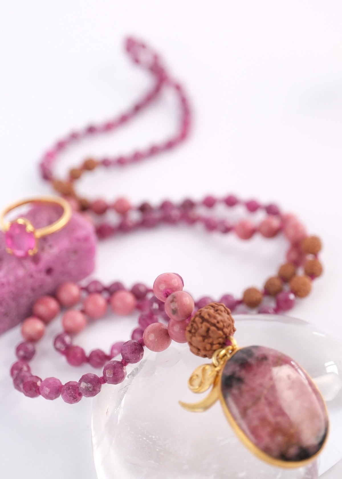 Raj Rani mala with faceted ruby, rhodonite beads and rhodonite pendant with rudraksha blessed