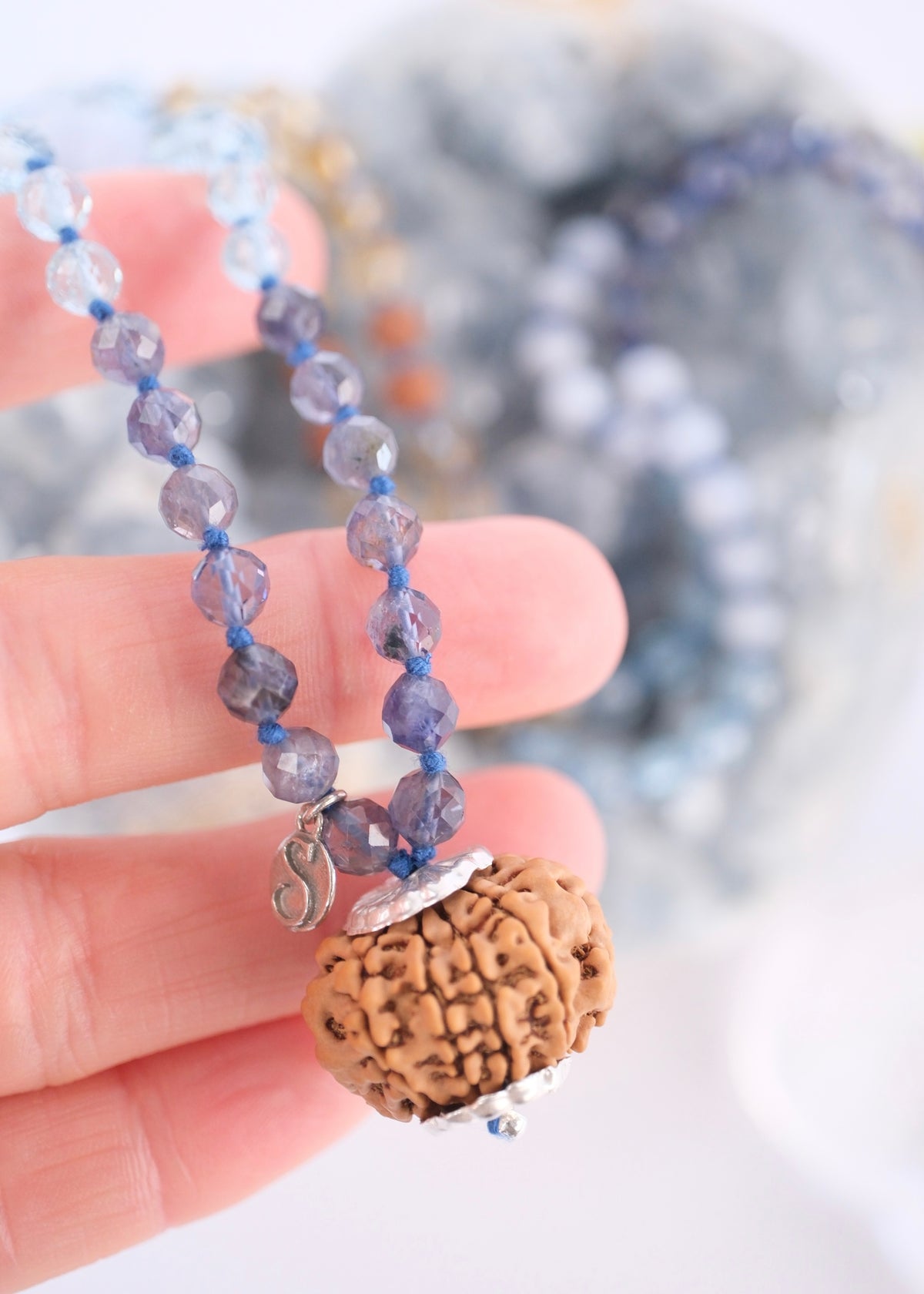 Iolite beads and Rudraksha