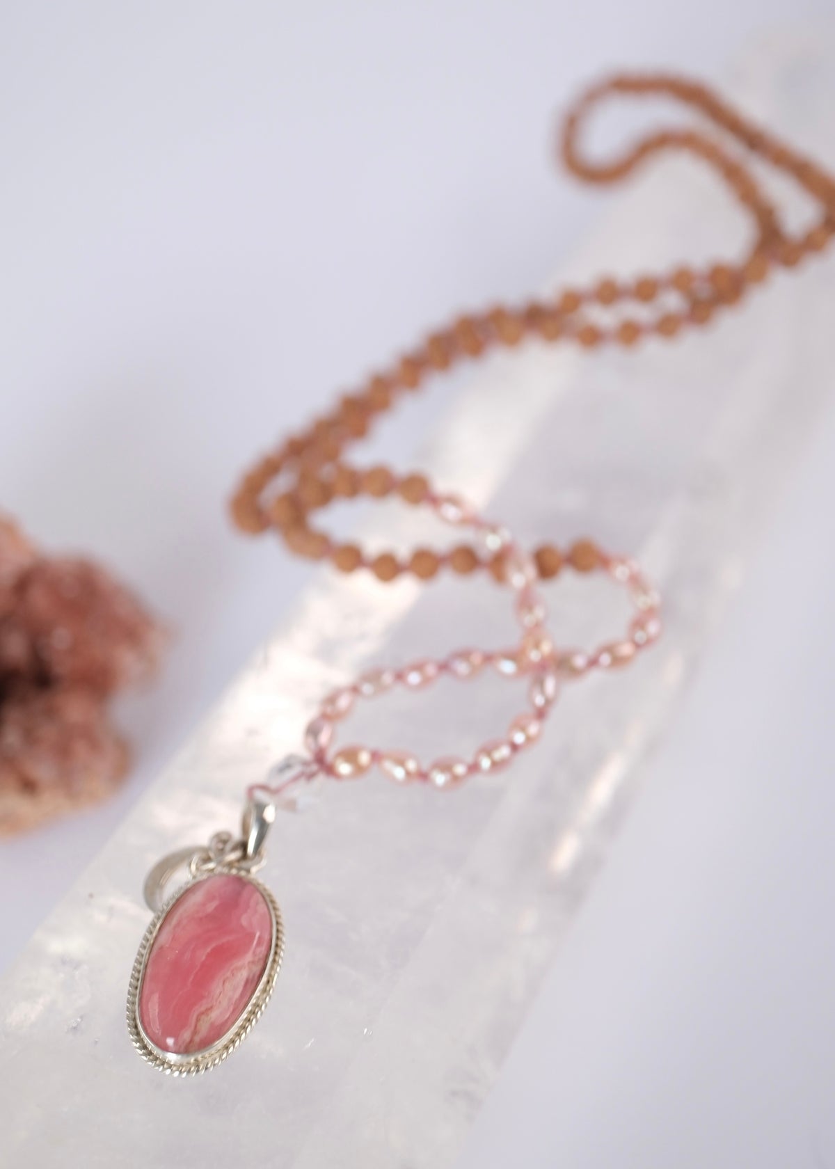 Madhurya mala with deep pink rhodochrosite pendant, small Rudraksha and pink Akoya pearls