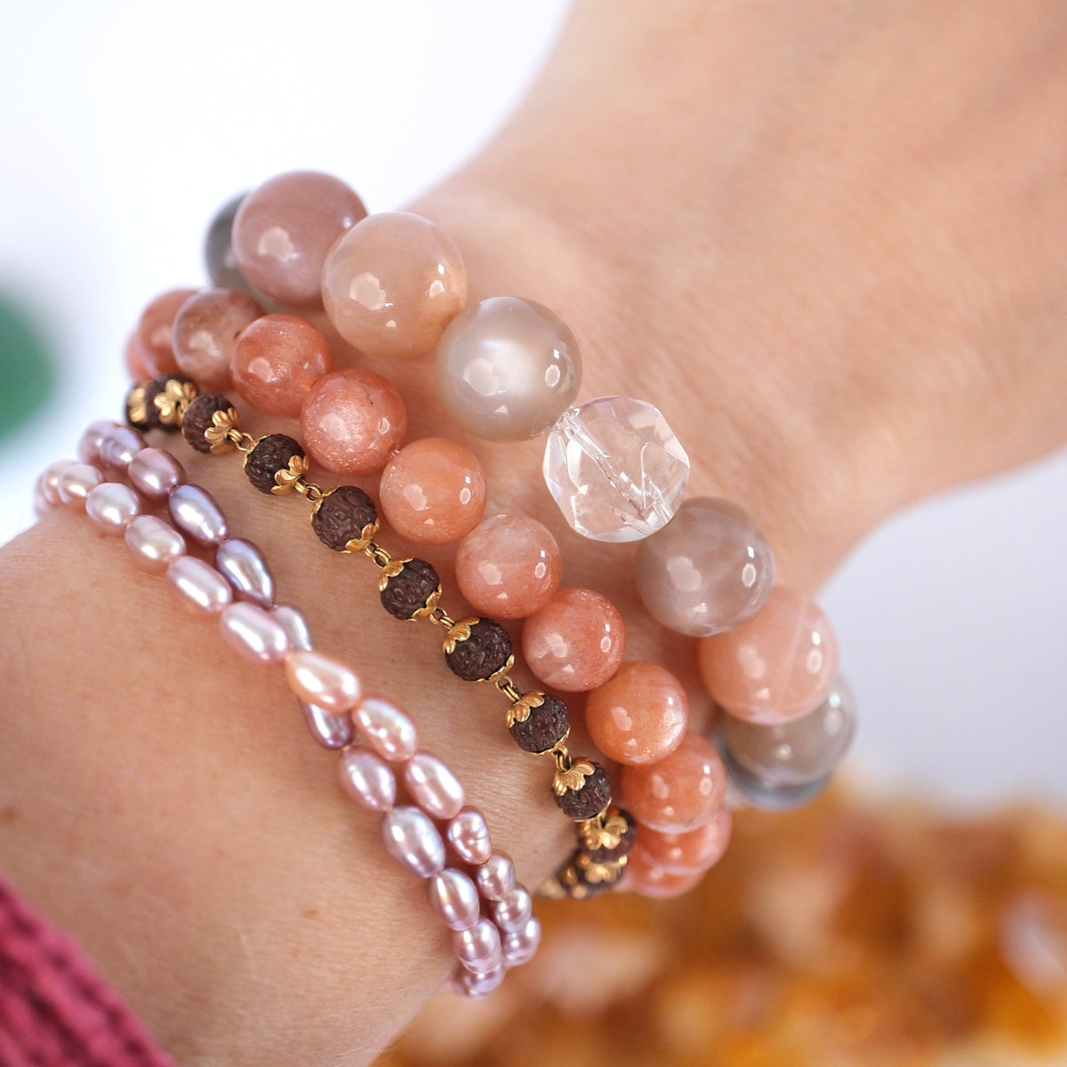 Glowing moonstone bracelet for intuition, feminine power, and new beginnings, worn at the wrist.