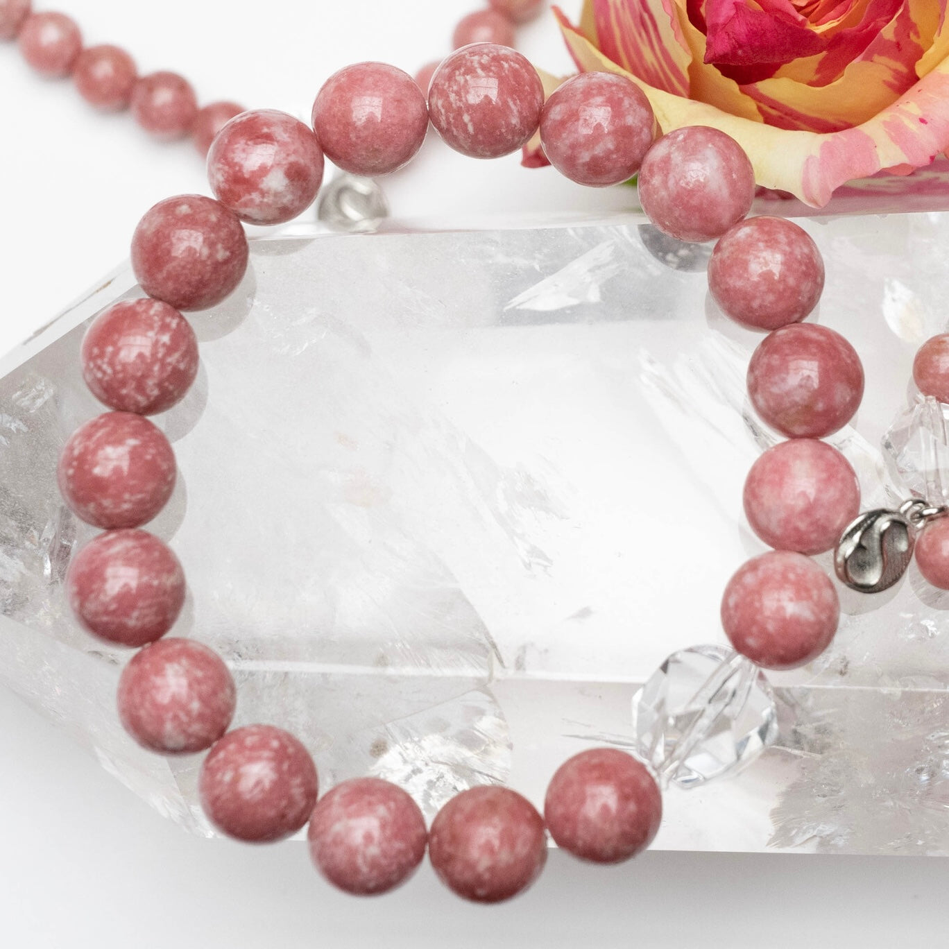 Lila bracelet of thulite with a 12mm Herkimer-style quartz by Shivoham
