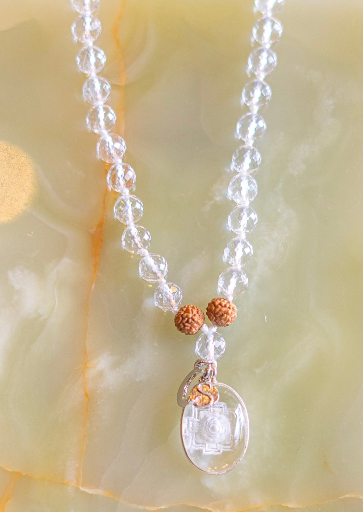 Divine Manifestation Mala SHRI | Hand-carved Himalayan Quartz Sri Yantra Sphatik Mala