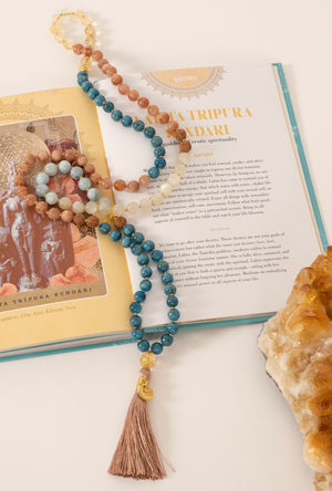 Women in Shivoham Mala Beads