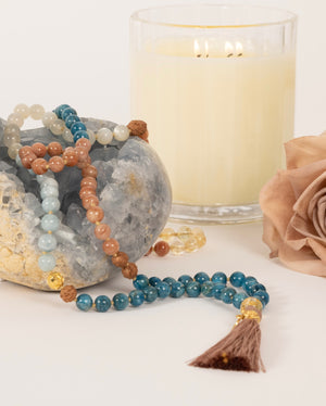 Women in Shivoham Mala Beads