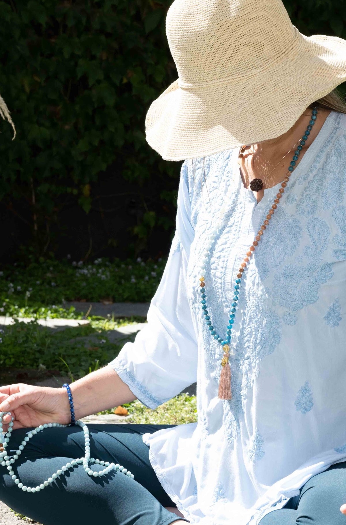 Women in Shivoham Mala Beads